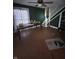A living room needing a cleanup, with a staircase visible in the background at 630 Congress Ave, Indianapolis, IN 46208