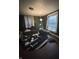 Cluttered living room with a couch, round rug, and curtains, needing tidying at 630 Congress Ave, Indianapolis, IN 46208
