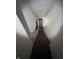 Stairway leading downstairs with textured walls at 630 Congress Ave, Indianapolis, IN 46208