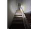 Stairway with worn carpet and wooden railing, highlighting the potential for renovation at 630 Congress Ave, Indianapolis, IN 46208