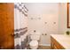 Cozy bathroom with shower featuring a black and white shower curtain, and modern fixtures at 632 Ridgeview Ln, Columbus, IN 47201