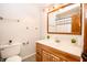 Cozy bathroom with wood vanity, modern fixtures, and a refreshing atmosphere at 632 Ridgeview Ln, Columbus, IN 47201
