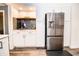Kitchen featuring stainless steel refrigerator, modern cabinets and countertop beverage center at 632 Ridgeview Ln, Columbus, IN 47201