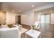 Open-concept living area offers hardwood floors, neutral paint, and modern furnishings at 632 Ridgeview Ln, Columbus, IN 47201