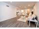 Bright living room boasts hardwood floors, recessed lighting, and modern decor at 632 Ridgeview Ln, Columbus, IN 47201