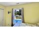 Bedroom view showcasing a swimming pool visible through the window at 7034 Endicott Way, Indianapolis, IN 46259