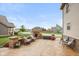 Enjoy this outdoor living space with a custom stone fireplace, comfortable seating, and beautiful landscaping at 732 Trillium St, Lebanon, IN 46052