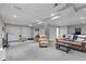 Finished basement with plush carpeting, rec area, and comfortable seating at 732 Trillium St, Lebanon, IN 46052