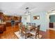 Charming dining room with seating for six and open view to the kitchen at 732 Trillium St, Lebanon, IN 46052