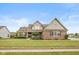 Beautiful single-Gathering home with mature lawn, tasteful landscaping, and brick exterior at 732 Trillium St, Lebanon, IN 46052