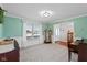 Cozy living room with carpeted floor, lots of light, and neutral walls at 732 Trillium St, Lebanon, IN 46052