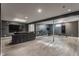 Finished basement with a cozy seating area and an exercise area with a stationary bike at 8415 Anchorage Ct, Indianapolis, IN 46236