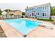 Large in-ground pool and diving board in the backyard of a lovely blue home at 8415 Anchorage Ct, Indianapolis, IN 46236