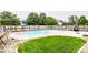 Large in-ground pool and well-manicured lawn in a fenced private backyard at 8415 Anchorage Ct, Indianapolis, IN 46236