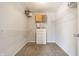 Walk-in closet with ample shelving and hanging space, including a set of drawers in the center at 8415 Anchorage Ct, Indianapolis, IN 46236