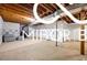 Unfinished basement space, offering versatile potential for storage and future finishing at 8500 N Ravenwood Dr, Muncie, IN 47303
