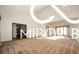 Spacious living room featuring hardwood floors and sliding doors providing seamless indoor-outdoor living at 8500 N Ravenwood Dr, Muncie, IN 47303