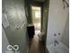 Bathroom with a tub and shower combo, along with vanity and toilet at 867 W 25Th St, Indianapolis, IN 46208