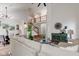 Bright living room showcasing an open layout with high ceilings and a staircase at 8695 Shoe Overlook Dr, Fishers, IN 46038