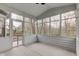 Relaxing screened porch with ample space, providing a serene outdoor living experience with scenic views at 8695 Shoe Overlook Dr, Fishers, IN 46038