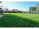 Backyard with playground, soccer net, and ample green space for Gathering fun and outdoor activities at 8808 Rocky Hill Rd, Indianapolis, IN 46217