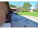 This home has a large backyard with a concrete patio, wood deck, storage shed, and lots of green space at 8808 Rocky Hill Rd, Indianapolis, IN 46217