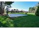 The backyard offers a basketball court, playground, soccer net, and seating, creating a recreational haven at 8808 Rocky Hill Rd, Indianapolis, IN 46217
