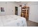 Comfortable bedroom featuring a four-post bed, carpet flooring, and natural light at 8808 Rocky Hill Rd, Indianapolis, IN 46217