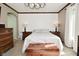 Comfortable bedroom featuring a neutral color scheme, wood trim, and ample natural light at 8808 Rocky Hill Rd, Indianapolis, IN 46217