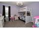 Bedroom featuring a bunkbed, desk, and a cozy rug at 8808 Rocky Hill Rd, Indianapolis, IN 46217