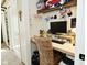 Organized closet space featuring a built-in desk area with drawers and a woven chair at 8808 Rocky Hill Rd, Indianapolis, IN 46217