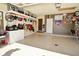 A well-organized garage features epoxy flooring, ample storage, and lots of space at 8808 Rocky Hill Rd, Indianapolis, IN 46217