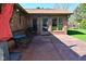 This home features an inviting brick patio with seating, perfect for outdoor relaxation and entertaining at 8808 Rocky Hill Rd, Indianapolis, IN 46217