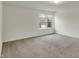 Bonus room featuring soft carpeting and a window that brings in great natural light and neighborhood views at 8961 Fitzgerald Dr, Indianapolis, IN 46239