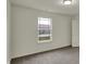 Neutral bedroom with a window offering natural light and a view at 8961 Fitzgerald Dr, Indianapolis, IN 46239