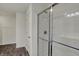 Bright bathroom showcasing a glass enclosed shower with silver hardware and fixtures at 8961 Fitzgerald Dr, Indianapolis, IN 46239