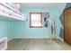Charming bedroom with light blue walls and a lofted bed at 918 N 700 W, Greenfield, IN 46140