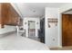 Functional kitchen featuring wood cabinets, gray countertops, and black appliances at 918 N 700 W, Greenfield, IN 46140