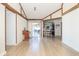 Bright living room with wood beams, and sliding doors to the outdoor space at 918 N 700 W, Greenfield, IN 46140