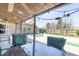 Covered patio with a ceiling fan and overlooking an outdoor pool area at 918 N 700 W, Greenfield, IN 46140