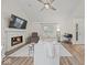 Beautiful living room featuring a fireplace, vaulted ceilings, and stylish decor at 936 Eagle Brook Cir, Shelbyville, IN 46176
