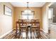 Dining area features pendant light and space for seating at 9609 Highgate N Cir, Indianapolis, IN 46250