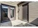 Patio featuring a sliding glass door, a storage closet and a stamped concrete patio at 9609 Highgate N Cir, Indianapolis, IN 46250