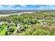 Picturesque aerial view of homes nestled amidst mature trees and well-maintained landscaping in a serene community at 9879 Ruby Ct, Mooresville, IN 46158
