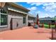 Red-stained deck with brick wall, awning, grill, patio furniture and a partially-fenced yard at 9879 Ruby Ct, Mooresville, IN 46158
