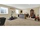 Finished basement area featuring an exercise area, a small kitchenette area, and neutral carpet at 9879 Ruby Ct, Mooresville, IN 46158