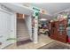 Finished basement with stairway, showcasing an open layout and a decorative design at 10518 Greenway Dr, Fishers, IN 46037