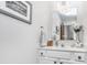 Bathroom with vanity, framed mirror, drawers for storage, and decor at 10518 Greenway Dr, Fishers, IN 46037