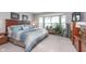 Cozy bedroom featuring a large bay window, providing ample natural light at 10518 Greenway Dr, Fishers, IN 46037