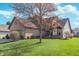 Charming brick home with well-manicured lawn and mature tree in a desirable neighborhood at 10518 Greenway Dr, Fishers, IN 46037